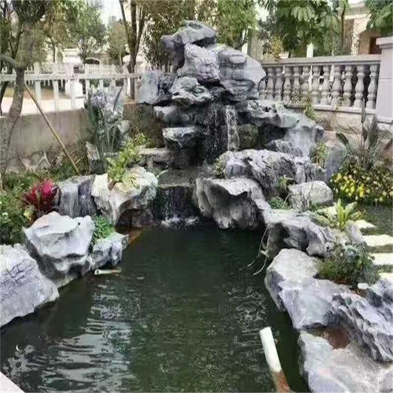 天元庭院鱼池假山图片